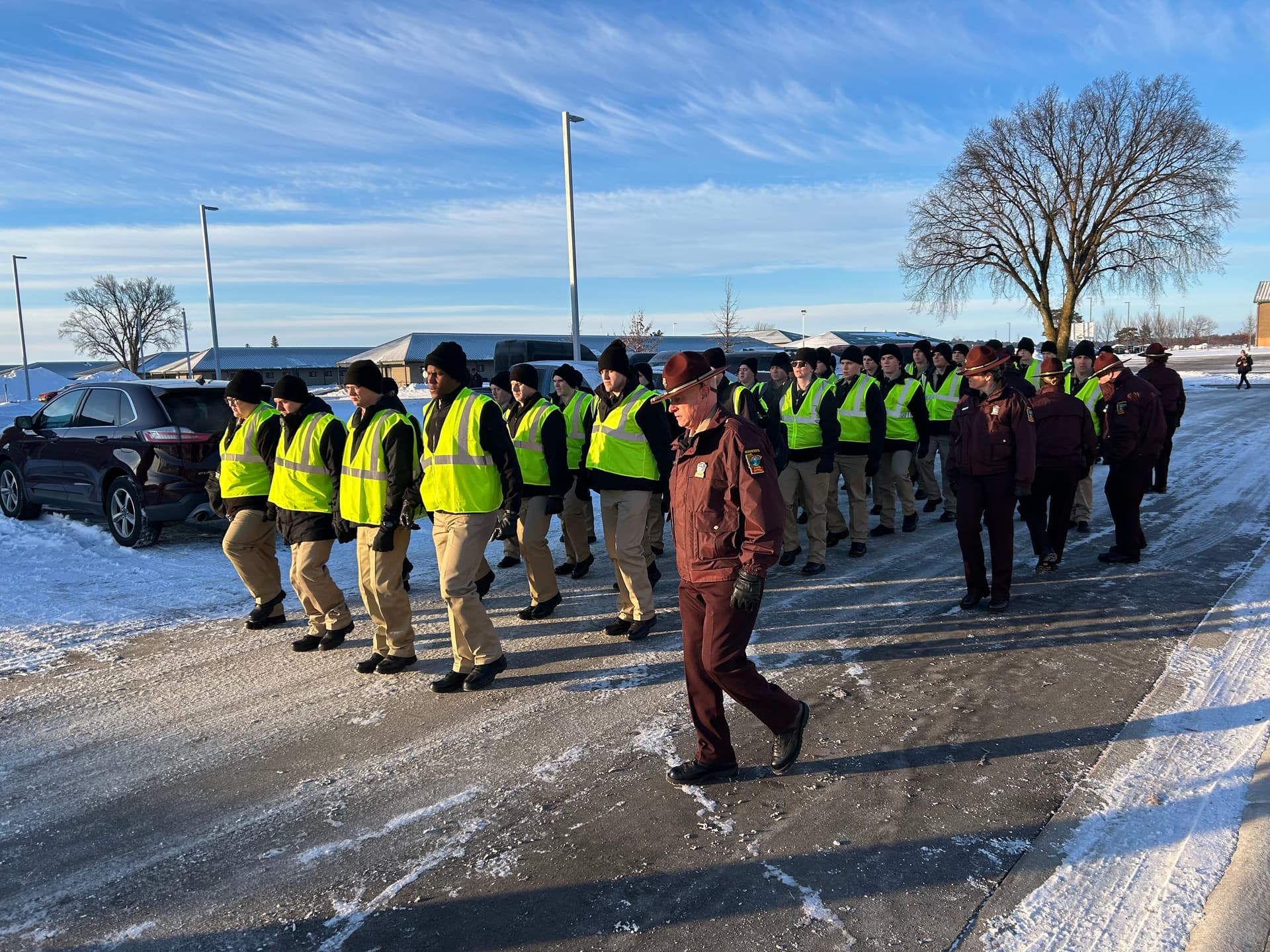 Photo of trooper academy cadets marching at Camp Ripley