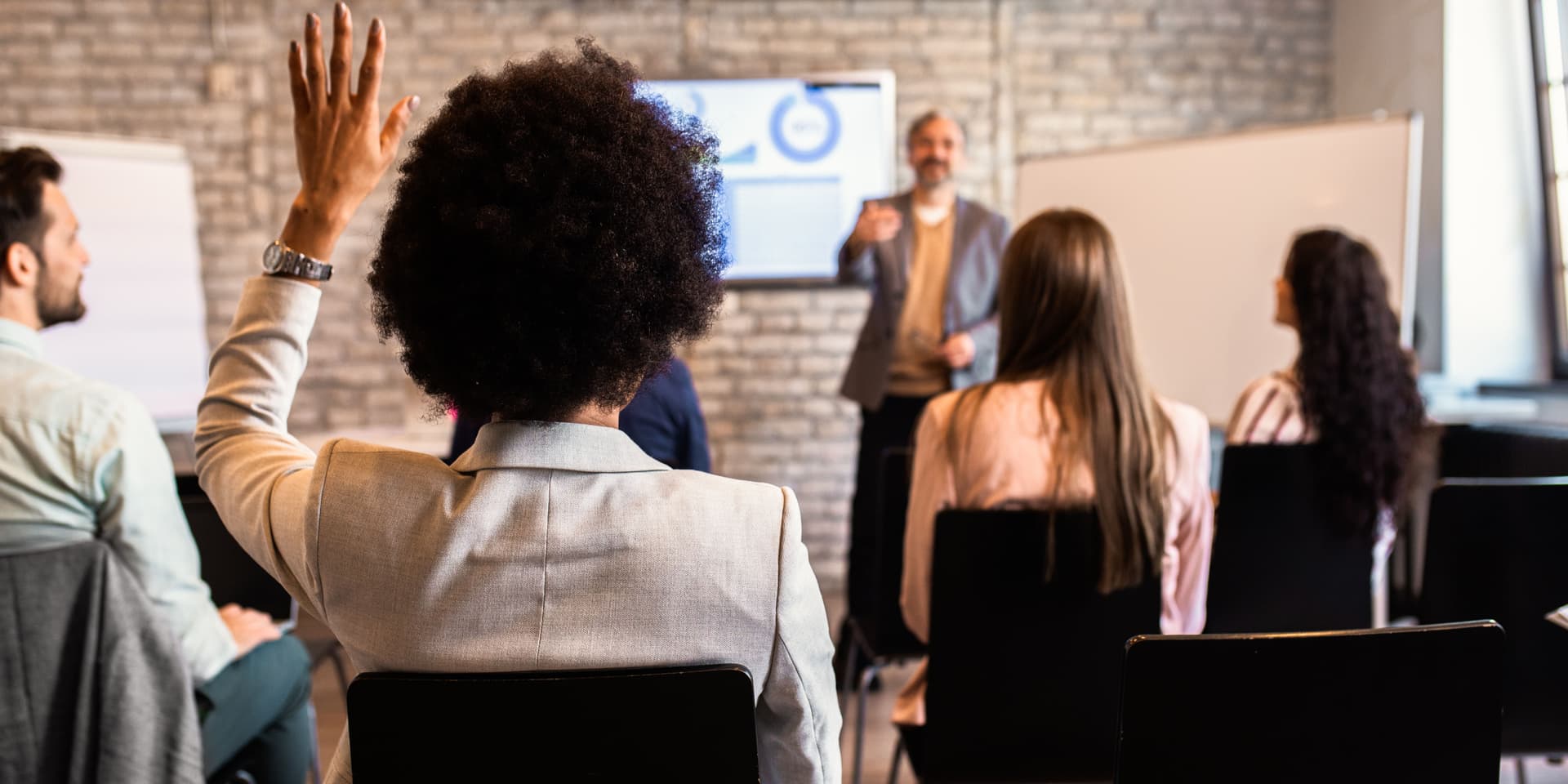 A group of employees in a meeting