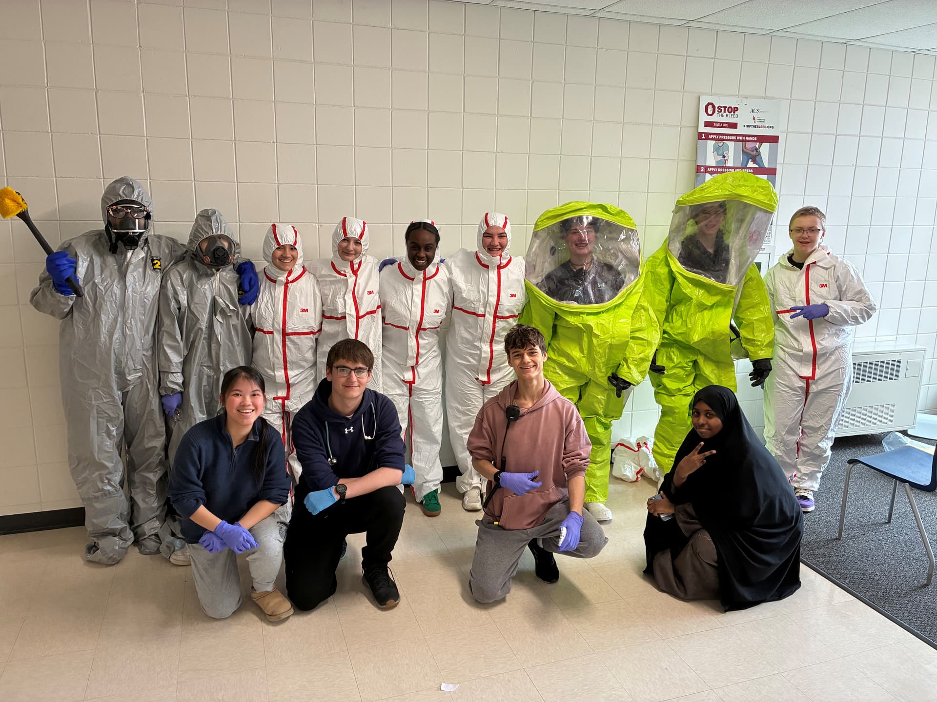 Students in hazmat suits