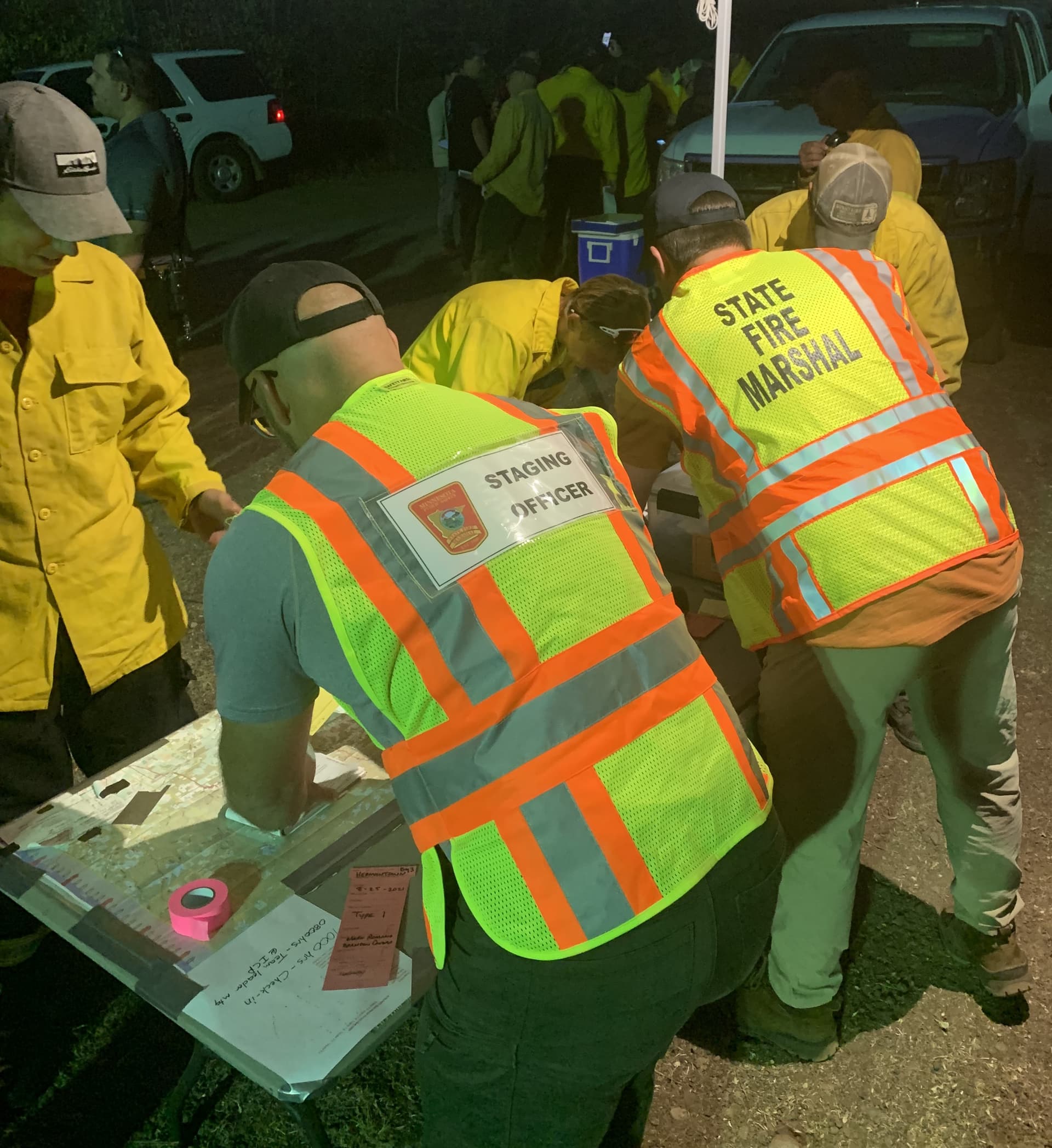 Fire marshal staff at a table planning. 